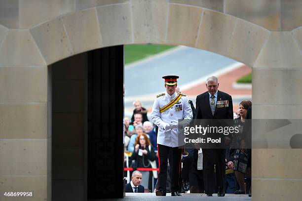 Prince Harry and the Chair of the Australian War Memorial Rear Admiral Ken Doolan arrive for a visit to the Australian War Memorial on April 6, 2015...