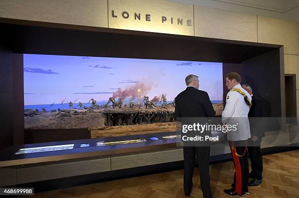 Prince Harry is seen touring the World War I exhibition during a visit to the Australian War Memorial on April 6, 2015 in Canberra, Australia. Prince...