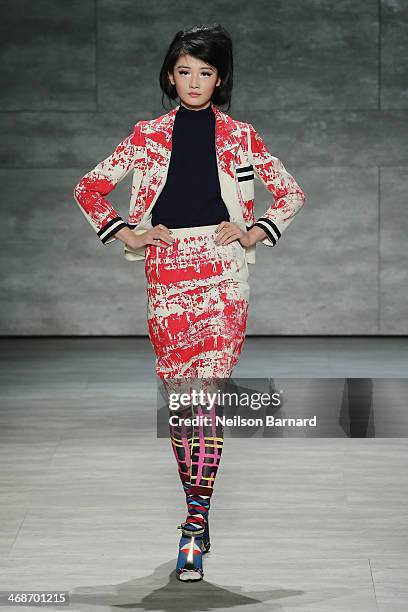 Model walks the runway at the Libertine fashion show during Mercedes-Benz Fashion Week Fall 2014 at The Pavilion at Lincoln Center on February 11,...