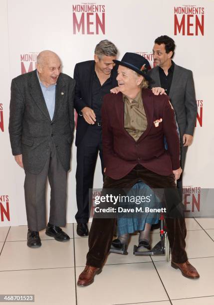 Bill Murray sits on Surviving Monuments Man Anne Olivier Bell as Surviving Monuments Man Harry Ettlinger, George Clooney and Grant Heslov look on...