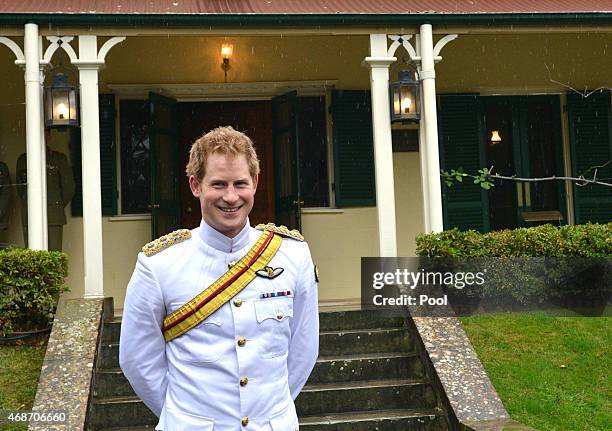 Prince Harry stands outside Duntroon House after arriving at the Royal Military College, Duntroon on April 6, 2015 in Canberra, Australia. Prince...