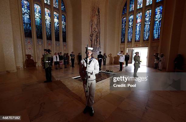 Prince Harry salutes after laying a wreath at the Tomb of the Unknown Soldier at the Australian War Memorial on April 6, 2015 in Canberra, Australia....