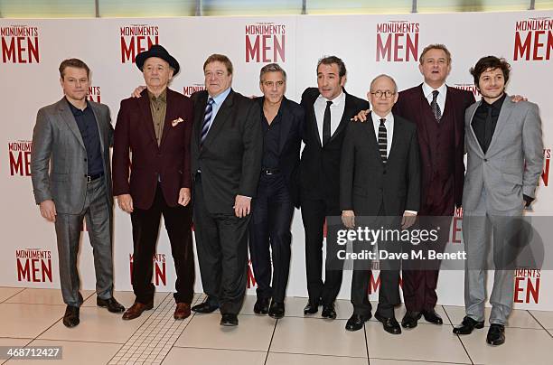 Matt Damon, Bill Murray, John Goodman, George Clooney, Jean Dujardin, Bob Balaban, Hugh Bonneville and Dimitri Leonidas attend the UK Premiere of...