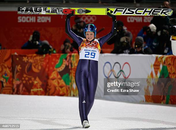 Carina Vogt of Germany celebrates winning the gold medal in the Ski Jumping Ladies Normal Hill Individual on day 4 of the Sochi 2014 Winter Olympics...