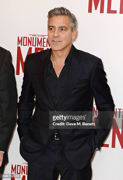 George Clooney attends the UK Premiere of "The Monuments Men" at Odeon Leicester Square on February 11, 2014 in London, England.