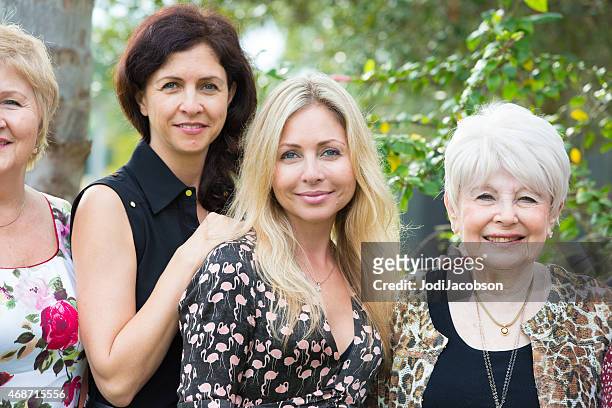 multi generational portrait of four caucasian women  rm - tall blonde women stock pictures, royalty-free photos & images