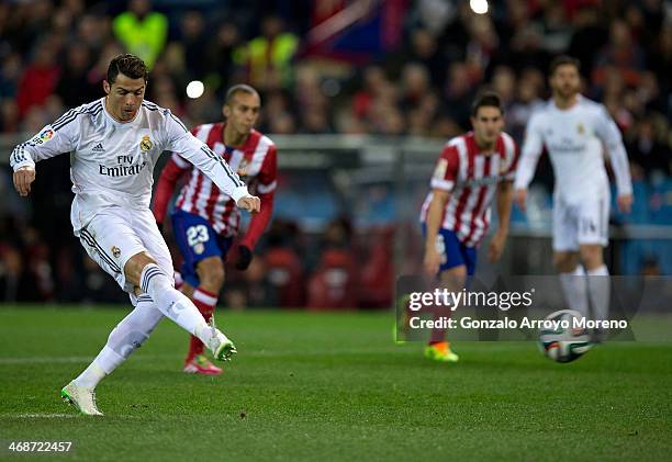 Cristiano Ronaldo of Real Madrid CF scores their opening goal from a penalty shot during the Copa del Rey semi-final second leg match between Club...