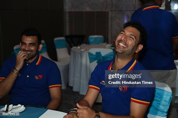 Indian cricketers Zaheer Khan and Yuvraj Singh during party thrown for Delhi Daredevils team players on April 3, 2015 in New Delhi, India.