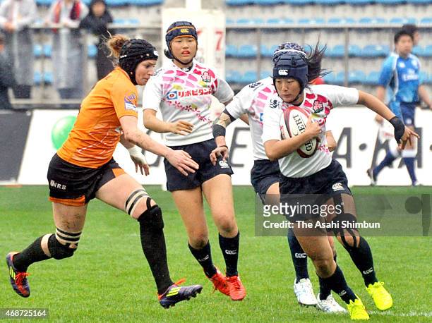 Chikami Inoue of Japan runs with the ball during the Women's sevens exhibition match against the Netherlands on day two of the Tokyo Sevens Rugby...