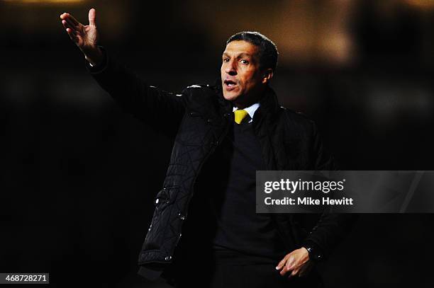 Norwich City manager Chris Hughton shouts instructions on the touchline during the Barclays Premier League match between West Ham United and Norwich...