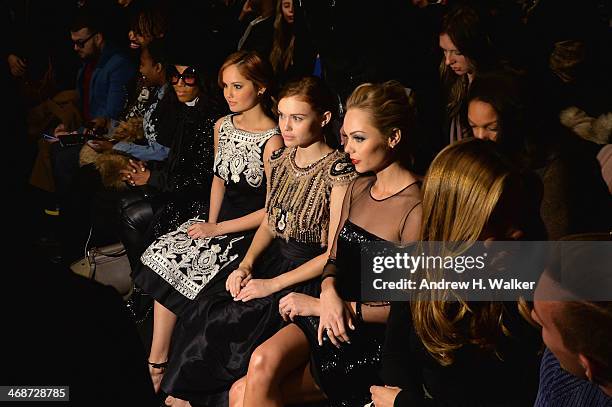 Debby Ryan, Holland Roden and Laura Vandervoort at the Naeem Khan show during Mercedes-Benz Fashion Week Fall 2014 at Lincoln Center for the...