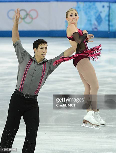 Canada's Paige Lawrence and Rudi Swiegers perform their figure skating short program at the Winter Olympics pairs competition at the Iceberg Skating...