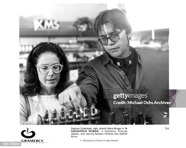 Actress Debra Winger listens to director Stephen Gyllenhaal on set of the Gramercy movie "A Dangerous Woman" circa 1993.