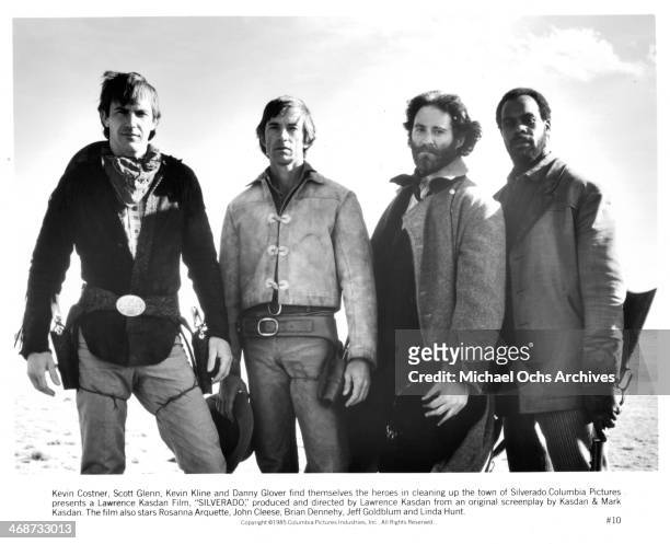 Actors Kevin Costner, Scott Glenn, Kevin Kline and Danny Glover on set the movie "Silverado" circa 1985.