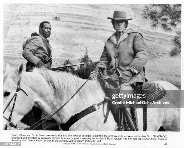 Actors Danny Glover and Scott Glenn on set the movie "Silverado" circa 1985.