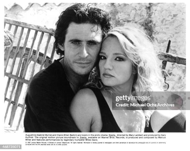 Actor Gabriel Byrne and actress Ellen Barkin on set of the movie "Siesta" circa 1987.