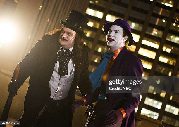 Michael Keaton" Episode 1679 -- Pictured: Bobby Moynihan as The Penguin and Taran Killam as The Joker during the monologue on April 4, 2015 --