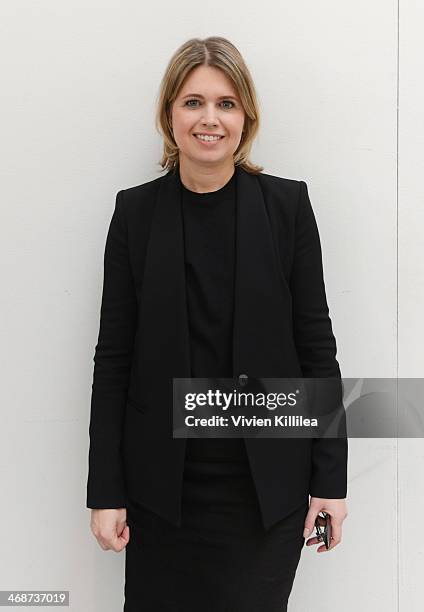 Fashion designer Jenny Packham poses backstage at Jenny Packham - Mercedes-Benz Fashion Week Fall 2014 at Industria Studios on February 11, 2014 in...