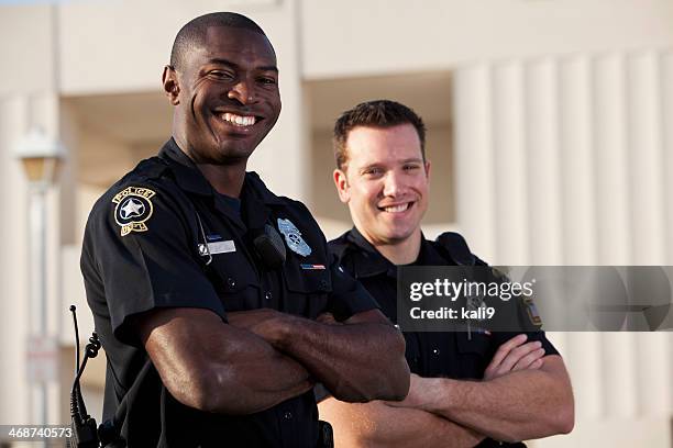 police officers - black police officer smiling stock pictures, royalty-free photos & images