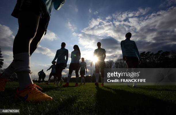 France's women's team players take part in a training session in Clairefontaine en Yvelines, southwest of Paris, on April 6 ahead of the friendly...