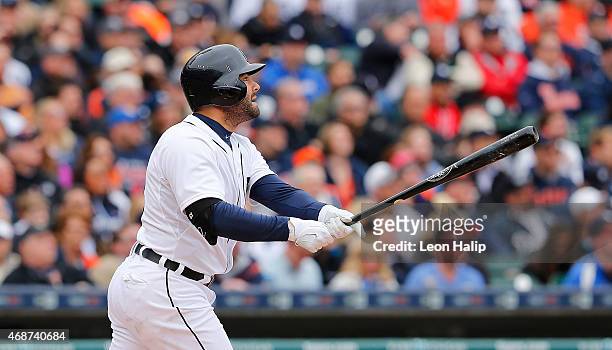 Alex Avila of the Detroit Tigers hits a two run home run to left field scoring Yoenis Cespedes during the second inning of the the Opening Day game...