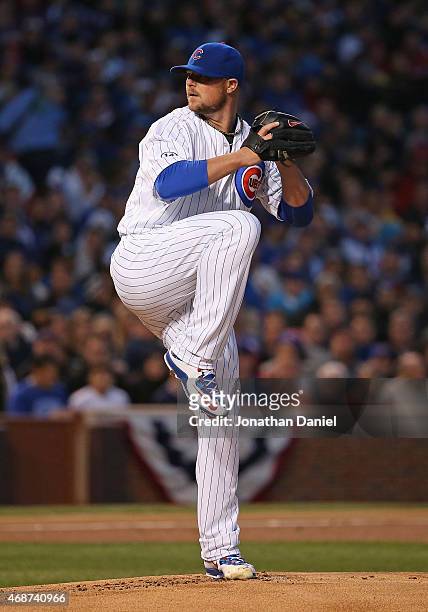 Starting pitcher Jon Lester of the Chicago Cubs delivers the ball against the St. Louis Cardinals during the Opening Night game at Wrigley Field on...