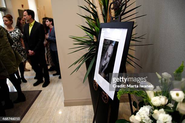 Photo of Carley Allison is framed in the hallway during a gathering of friends and family to celebrate the life of Carley Allison at Millennium...
