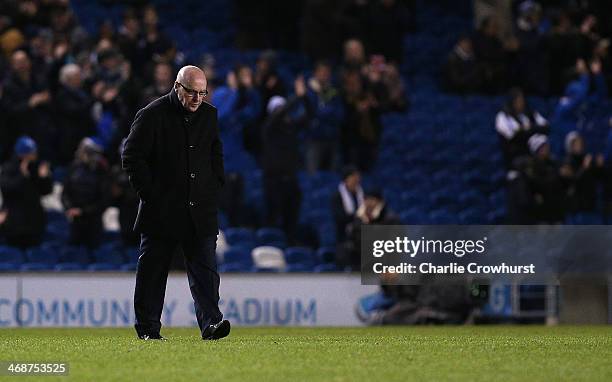 Leeds' manager Brian McDermott walks onto the pitch dejected after the final whistle during the Sky Bet Championship match between Brighton & Hove...