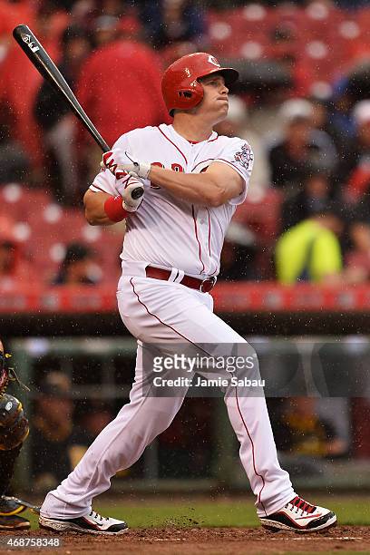 Jay Bruce of the Cincinnati Reds watches his solo home run sail over the right field fence in the fourth inning against the Pittsburgh Pirates on...