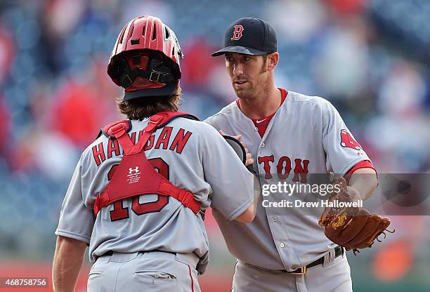 Tommy Layne and Ryan Hanigan of the Boston Red Sox celebrate after an 8-0 win over the Philadelphia Phillies during Opening Day at Citizens Bank Park...