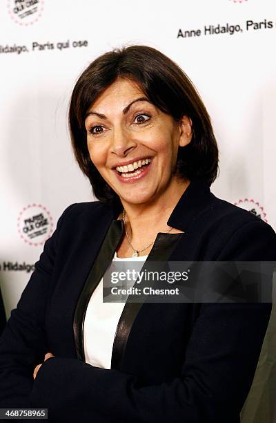 Paris PS mayoral candidate Anne Hidalgo poses prior a campaign meeting on February 11, 2014 in Paris, France. Anne Hidalgo is currently campaigning...