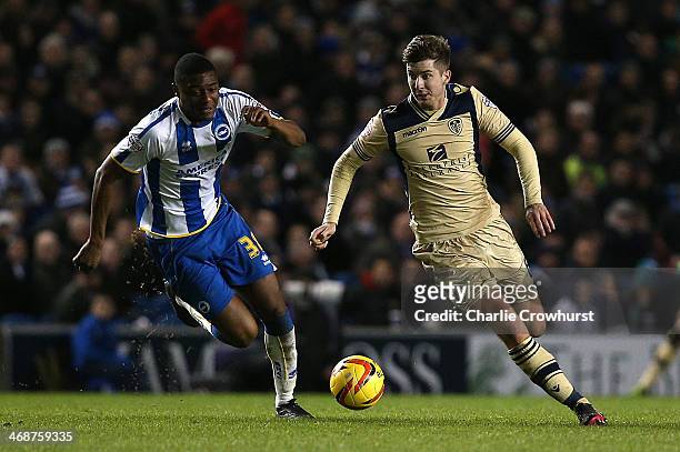 Luke Murphy of Leeds turns Brighton's Rohan Ince during the Sky Bet Championship match between Brighton & Hove Albion and Leeds United at The Amex...