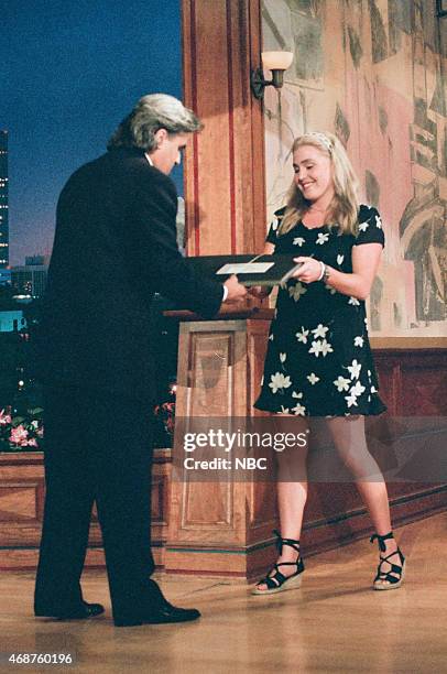 Episode 945 -- Pictured: Host Jay Leno greets swimmer Susie Maroney as she delivers the headlines on June 17, 1996 --