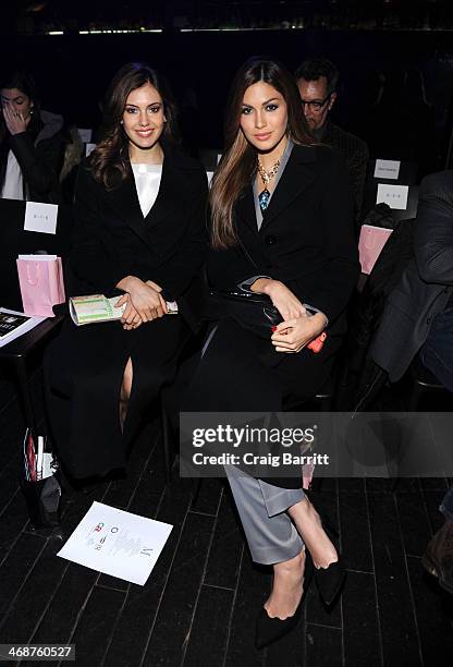 Erin Brady and Gabriela Isler attend the Malan Breton fashion show during Mercedes-Benz Fashion Week Fall 2014 at XL Nightclub on February 11, 2014...