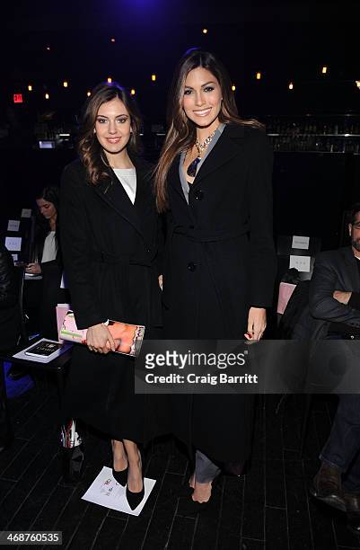 Erin Brady and Gabriela Isler attend the Malan Breton fashion show during Mercedes-Benz Fashion Week Fall 2014 at XL Nightclub on February 11, 2014...