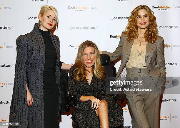 Director Gren Wells, Dr. Danielle Sheypuk and actress Kyra Sedgwick pose for photos during the "The Road Within" New York Premiere at The JCC center...