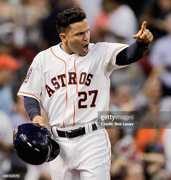 Jose Altuve of the Houston Astros scores in the sixth inning against the Cleveland Indians on Opening Day at Minute Maid Park on April 6, 2015 in...