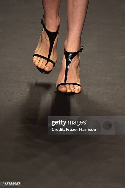 Model walks the runway at the Naeem Khan fashion show during Mercedes-Benz Fashion Week Fall 2014 at The Theatre at Lincoln Center on February 11,...