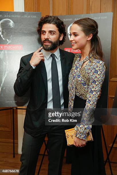 Oscar Isaac and Alicia Vikander attend "Ex Machina" New York Premiere at Crosby Street Hotel on April 6, 2015 in New York City.