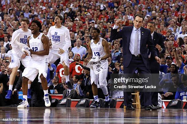 Head coach Mike Krzyzewski of the Duke Blue Devils and his bench react after a play in the second half during the NCAA Men's Final Four National...
