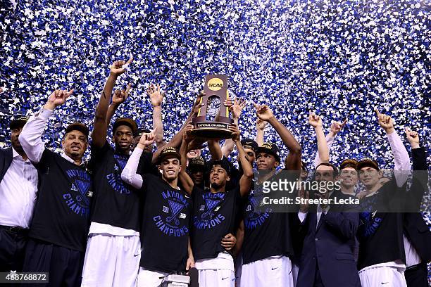 The Duke Blue Devils celebrate with the championship trophy after defeating the Wisconsin Badgers during the NCAA Men's Final Four National...