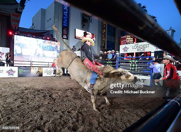 Professional bull rider performs at the premiere of Twentieth Century Fox's "The Longest RIde" at the TCL Chinese Theatre IMAX on April 6, 2015 in...