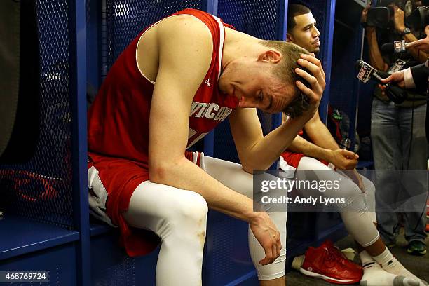 Sam Dekker of the Wisconsin Badgers reacts in the locker room after being defeated by the Duke Blue Devils during the NCAA Men's Final Four National...