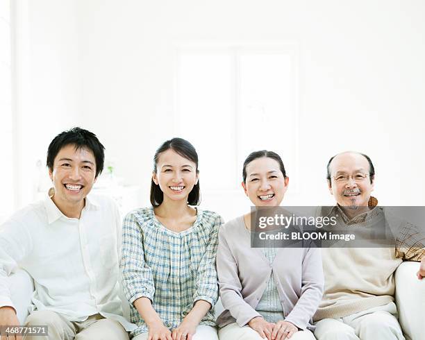 135 Family Sitting One Row Stock Photos, High-Res Pictures, and Images ...