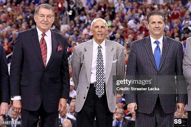 Jerry Colangelo poses with 2015 Naismith Hall of Fame Inductees Dick Bavetta and John Calipari on the court during the NCAA Men's Final Four National...