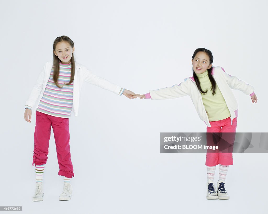 Two Girls Holding Hand