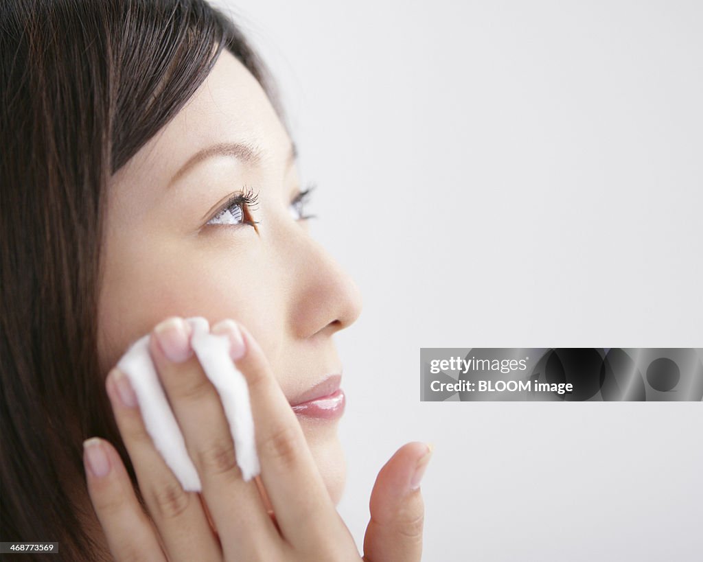 Woman Cleaning Face