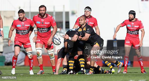 Will Helu of Wasps passes the ball during the European Rugby Champions Cup quarter final match between RC Toulon and Wasps at the Felix Mayol Stadium...