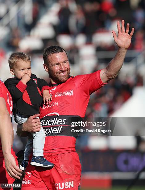 Matt Giiteau of Toulon celebrates victory with his son during the European Rugby Champions Cup quarter final match between RC Toulon and Wasps at the...