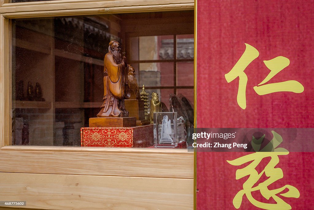 Statue of Confucius in a souvenir shop at the Temple of...